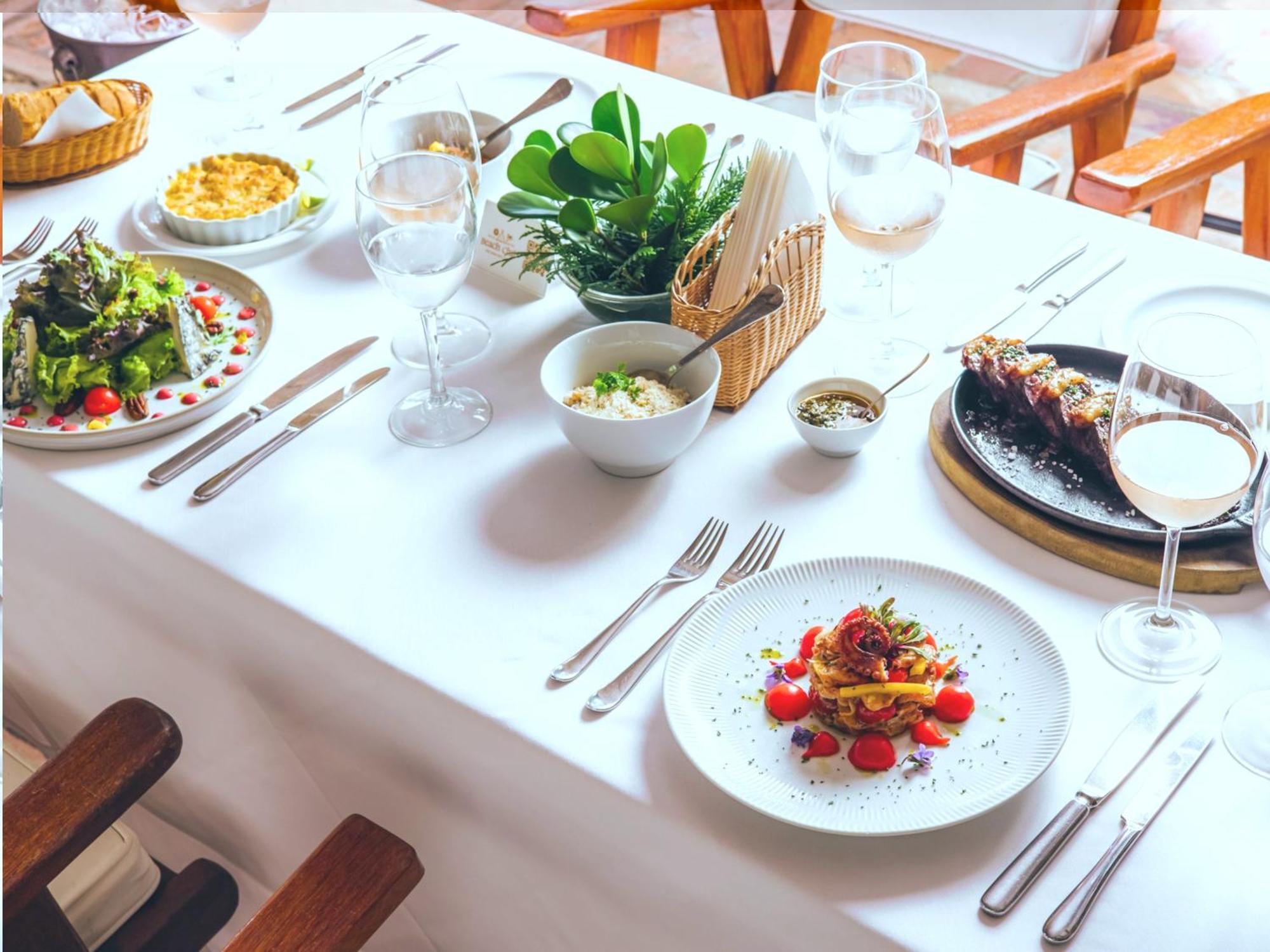Dpny ビーチ ホテル ＆ スパ イリャベラ エクステリア 写真 A table set for fine dining